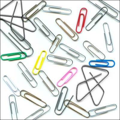 paperclips working business files folders desk